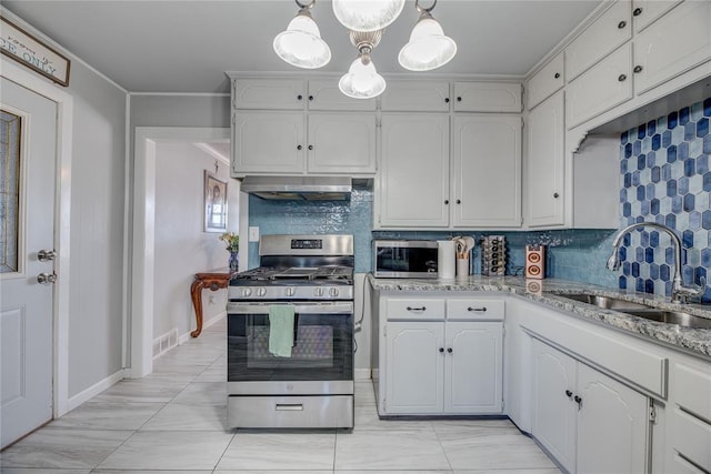 kitchen featuring white cabinetry, appliances with stainless steel finishes, and sink