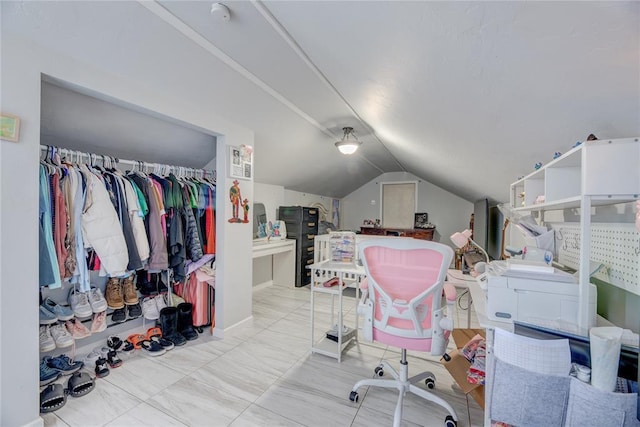 office area with lofted ceiling