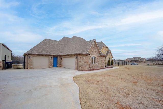 view of side of property featuring a garage