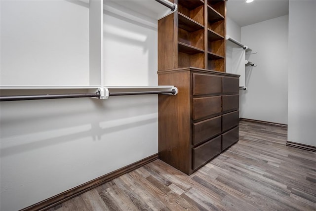 spacious closet with light wood-type flooring