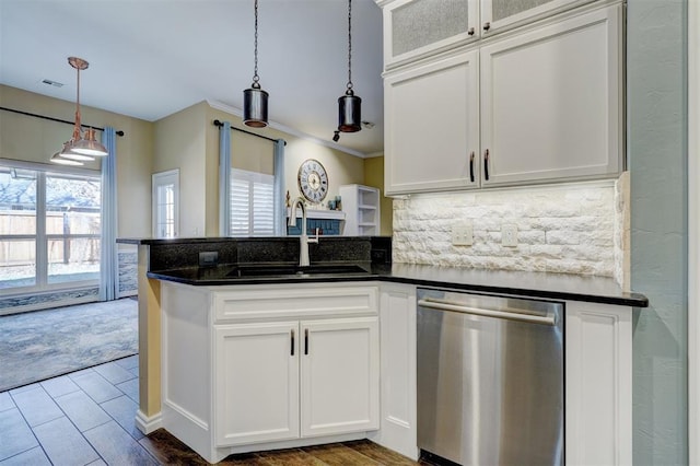 kitchen featuring white cabinetry, dishwasher, and sink