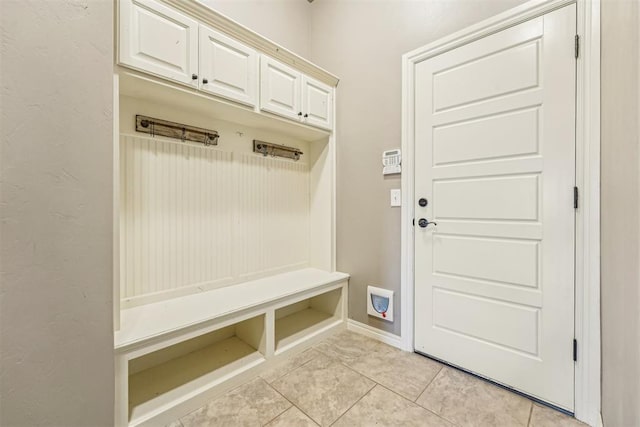 mudroom featuring light tile patterned flooring