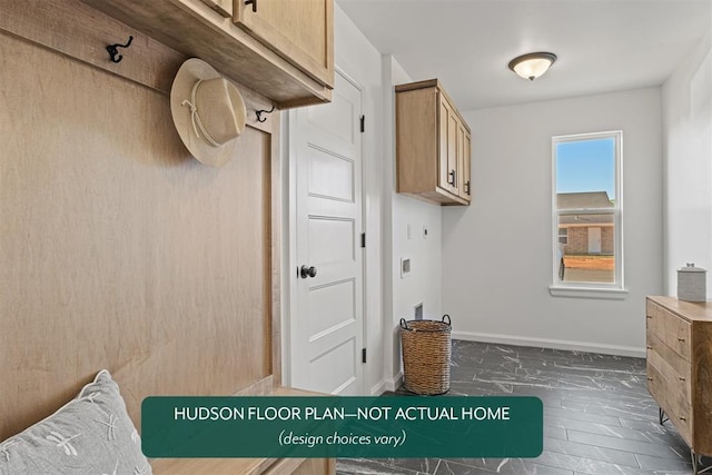 interior space with cabinets and hookup for an electric dryer