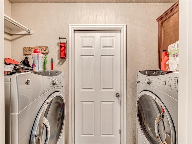 laundry room with washer and clothes dryer