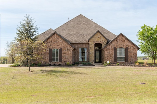 view of front of home with a front yard