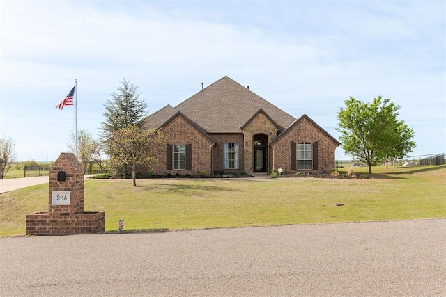 view of front of home with a front yard