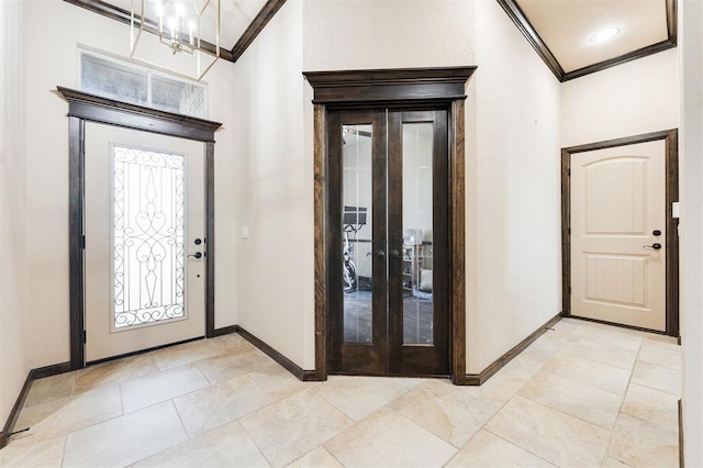 foyer featuring crown molding