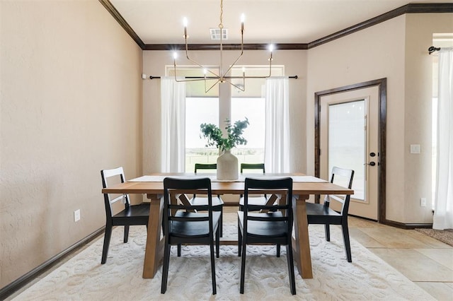 dining space featuring light tile patterned floors, ornamental molding, and a chandelier