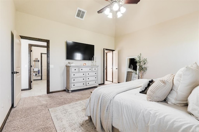 bedroom with light carpet and ceiling fan