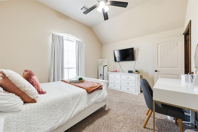 bedroom with lofted ceiling, light colored carpet, and ceiling fan