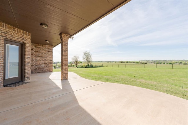 view of patio with a rural view