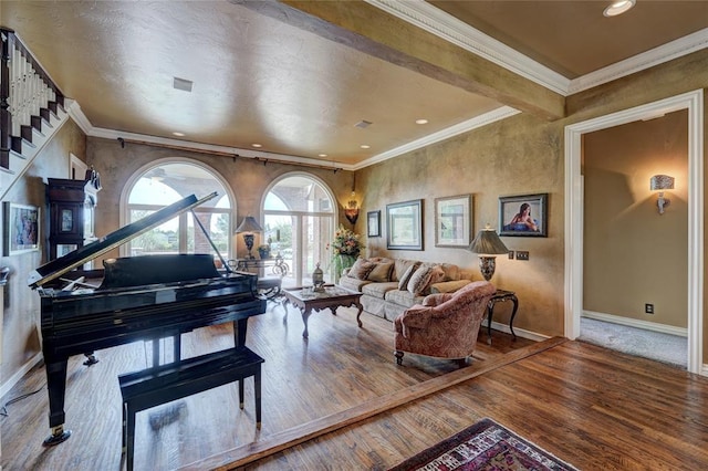 living room featuring crown molding and hardwood / wood-style flooring