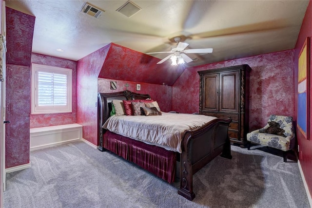 bedroom featuring vaulted ceiling, ceiling fan, and carpet