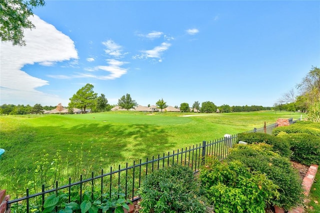 view of yard with a rural view