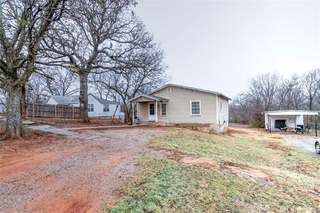 view of front of house with a carport