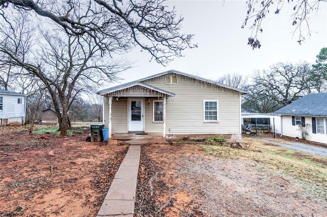 bungalow-style home featuring covered porch