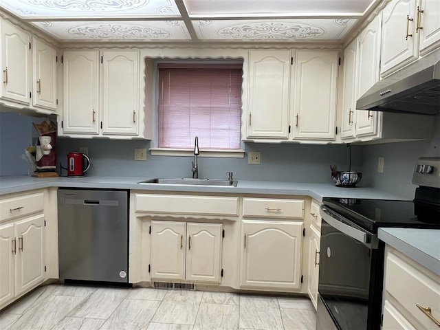 kitchen with electric range, light countertops, stainless steel dishwasher, under cabinet range hood, and a sink