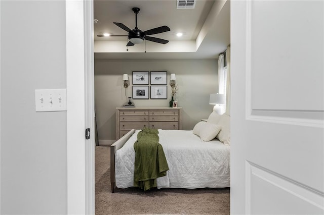 carpeted bedroom featuring ceiling fan