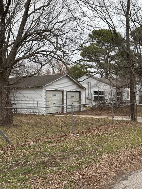 exterior space featuring a garage