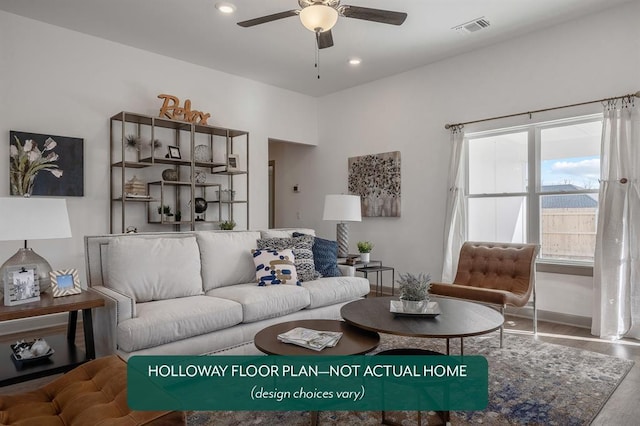 living room with ceiling fan and hardwood / wood-style floors