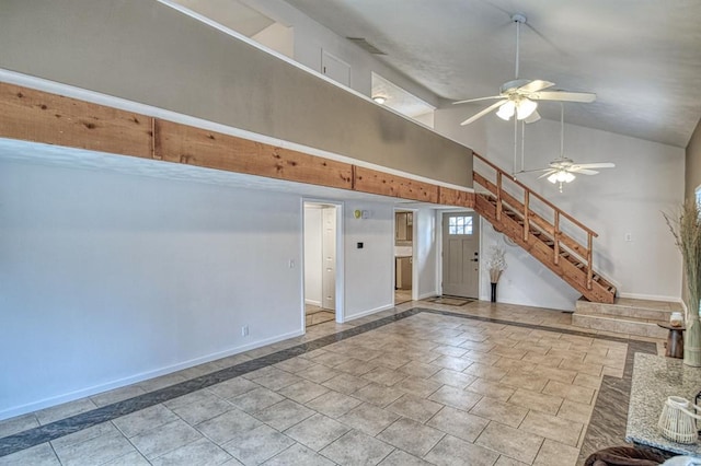 interior space with ceiling fan and high vaulted ceiling