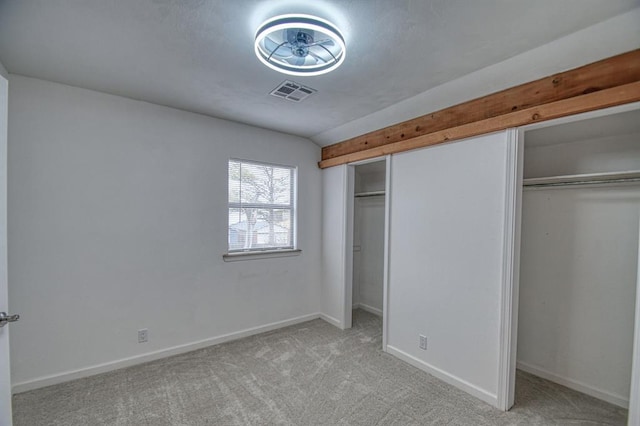 unfurnished bedroom with light carpet