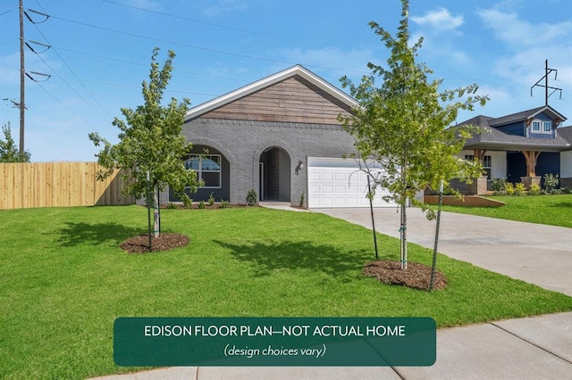 view of front of house with a garage and a front lawn