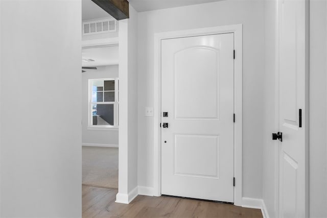 3400 Piney River Dr, Yukon, OK 73099 - entryway featuring baseboards, visible vents, and wood finished floors