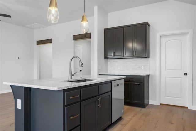 3400 Piney River Dr, Yukon, OK 73099 - kitchen with a sink, light wood-style floors, light stone countertops, dishwasher, and tasteful backsplash