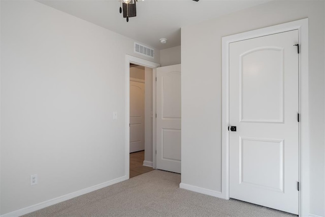 3400 Piney River Dr, Yukon, OK 73099 - unfurnished bedroom with ceiling fan, carpet flooring, visible vents, and baseboards