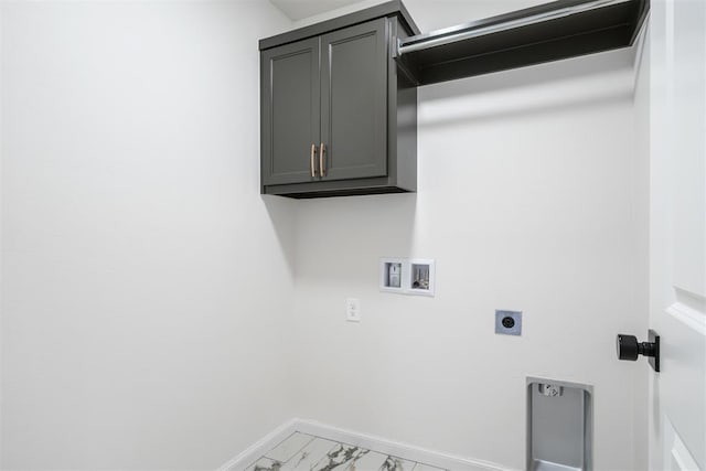 3400 Piney River Dr, Yukon, OK 73099 - washroom featuring hookup for a washing machine, hookup for an electric dryer, baseboards, marble finish floor, and cabinet space