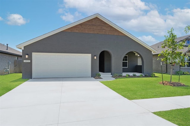 3400 Piney River Dr, Yukon, OK 73099 - view of front of home featuring brick siding, a front lawn, driveway, a porch, and an attached garage
