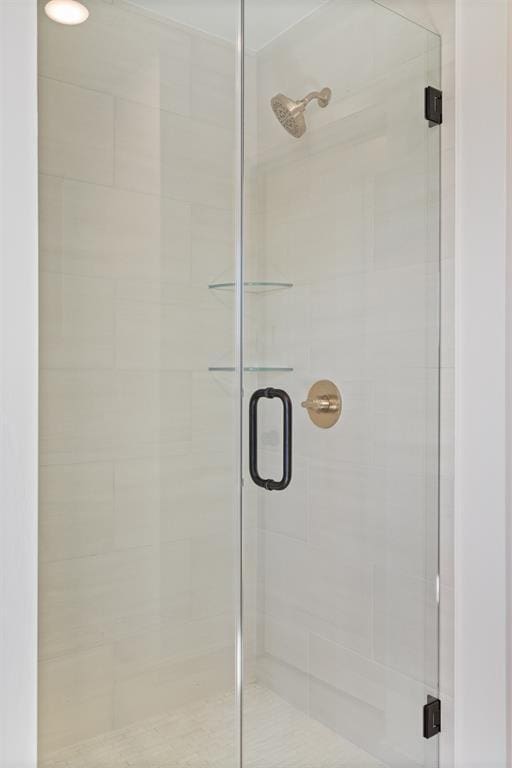 full bathroom with a stall shower