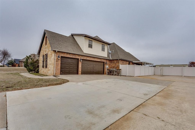 view of property exterior featuring a garage