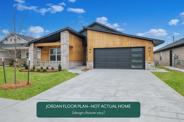 contemporary house featuring a garage and a front lawn