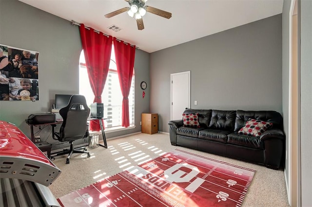 home office featuring ceiling fan and carpet floors