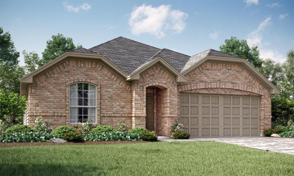 view of front facade with a garage and a front lawn