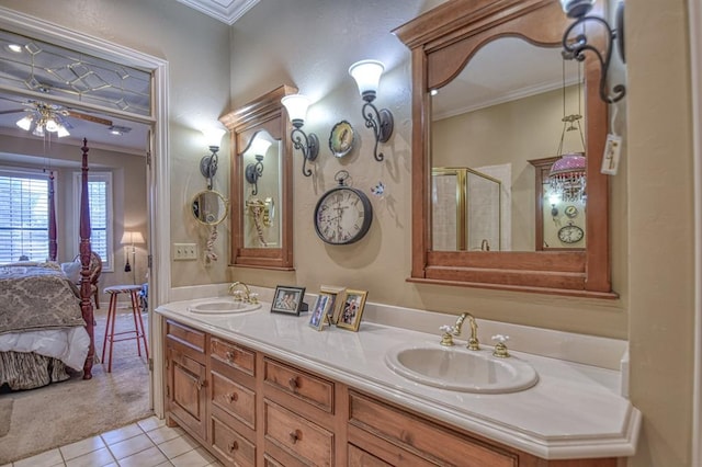 3225 Cotswold Sq, Norman, OK 73072 - bathroom with tile patterned flooring, vanity, ornamental molding, and walk in shower