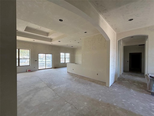 spare room featuring a tray ceiling