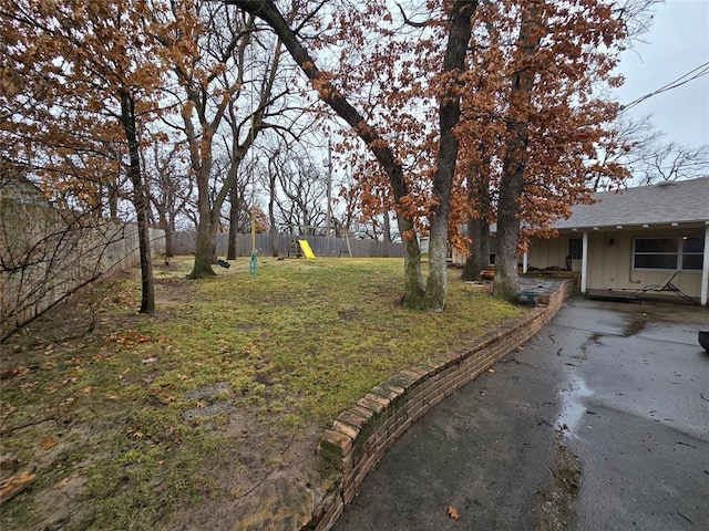 view of yard with a playground