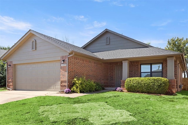 single story home with a garage and a front yard