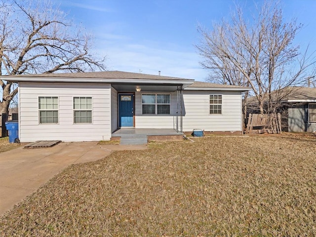 ranch-style house with a front yard