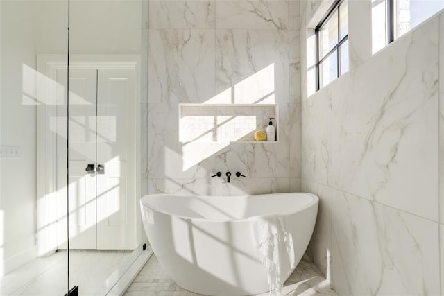 bathroom with a tub