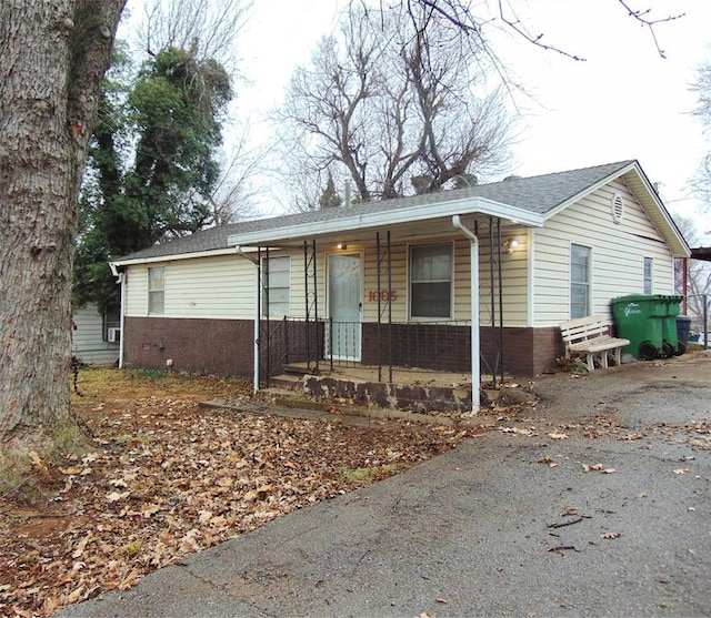 view of front of home featuring covered porch