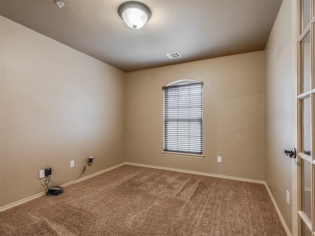 view of carpeted spare room