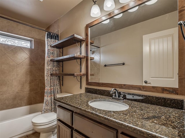 full bathroom featuring vanity, shower / bathtub combination with curtain, and toilet