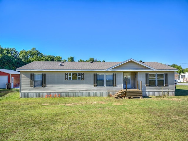 view of front of home with a front yard