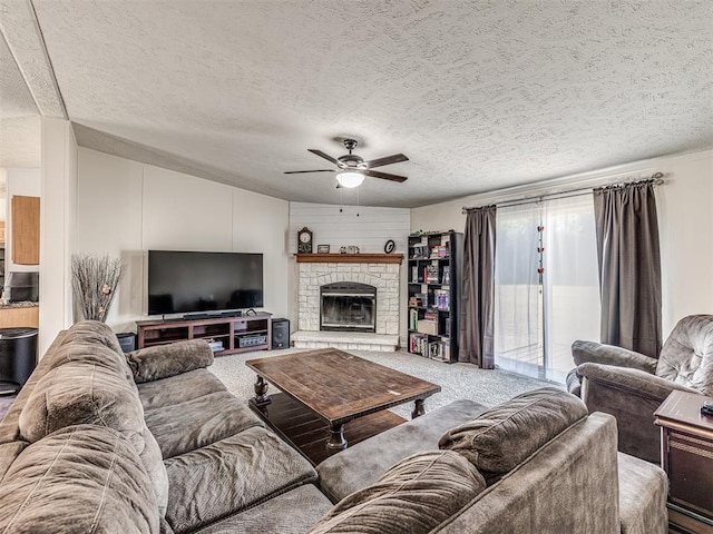 carpeted living room featuring ceiling fan, vaulted ceiling, a brick fireplace, and a textured ceiling