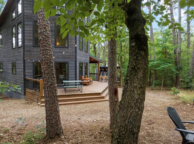 view of yard featuring a deck