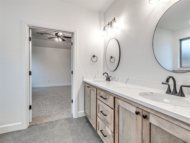 bathroom featuring vanity and ceiling fan